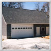 Two Stall Garage with First Floor Workshop and 2nd Story Apartment